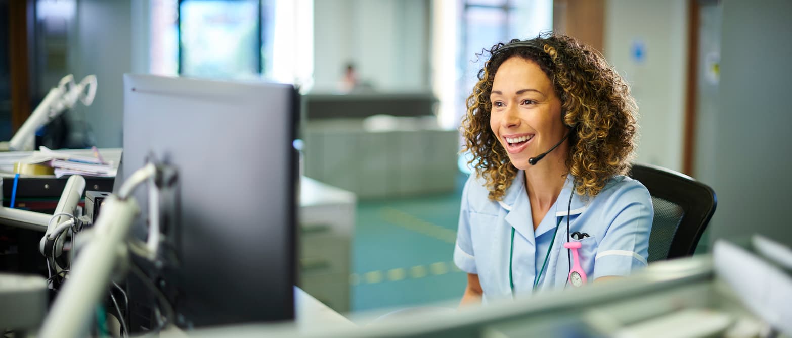 Healthcare professional in a modern medical facility providing patient care, representing career opportunities in healthcare
